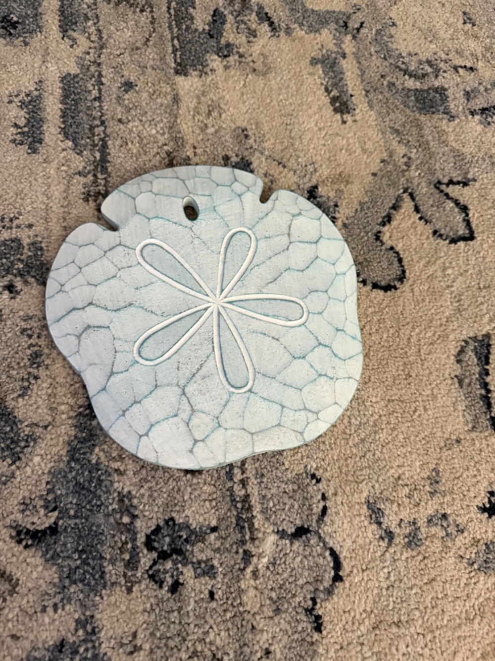 Ceramic Sand Dollar Wall Accent in Pale Aqua